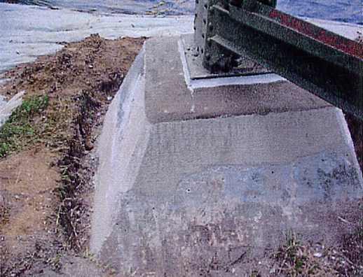 Installation of Tapered Cap and Seal Around Base Plate.